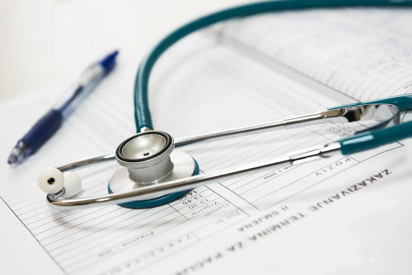 Parathyroid treatment in Lahore: a stethoscope and pen on test result forms