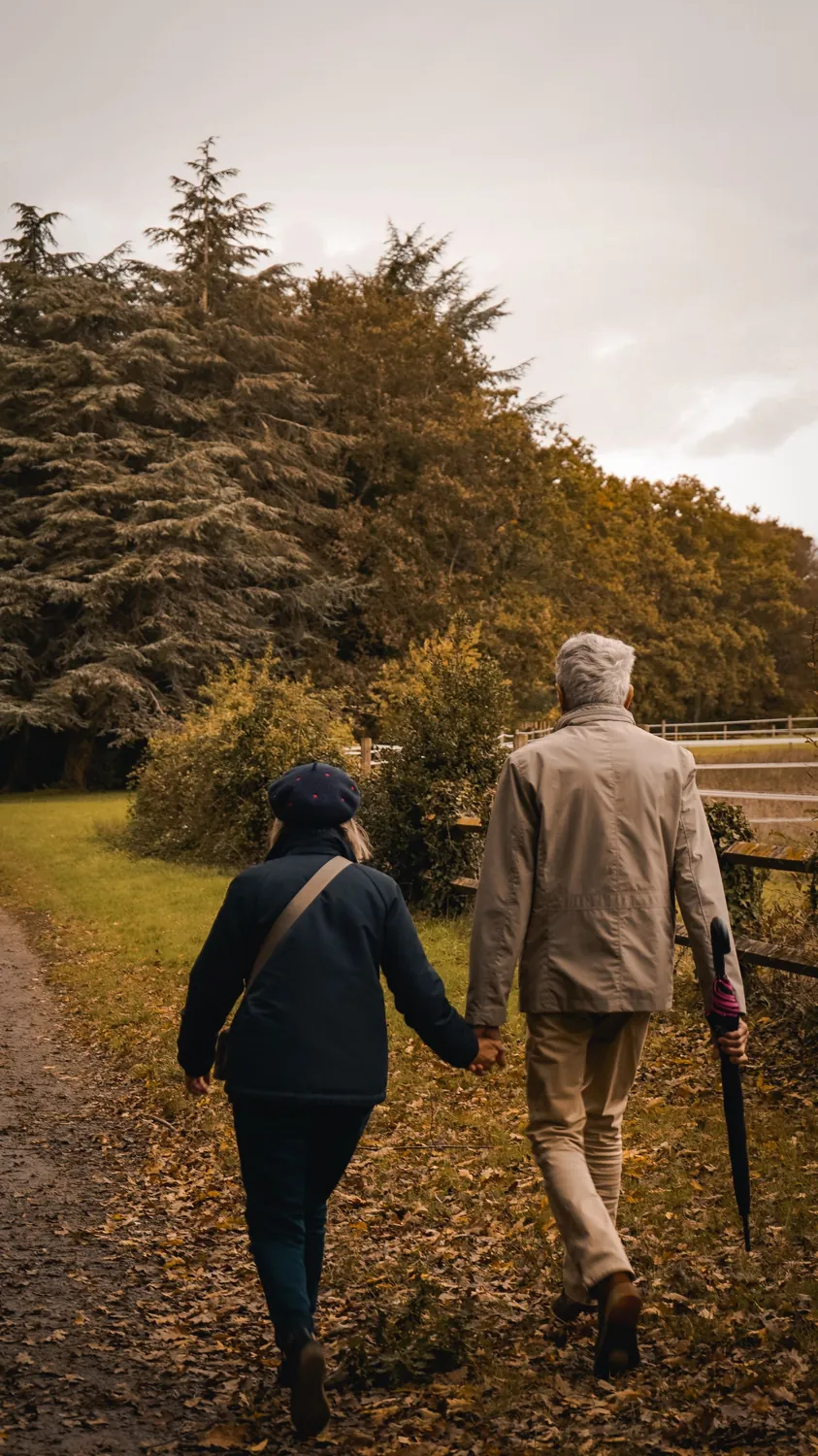 Elderly couple walking - osteoporosis affects older adults, specialist care in DHA Lahore